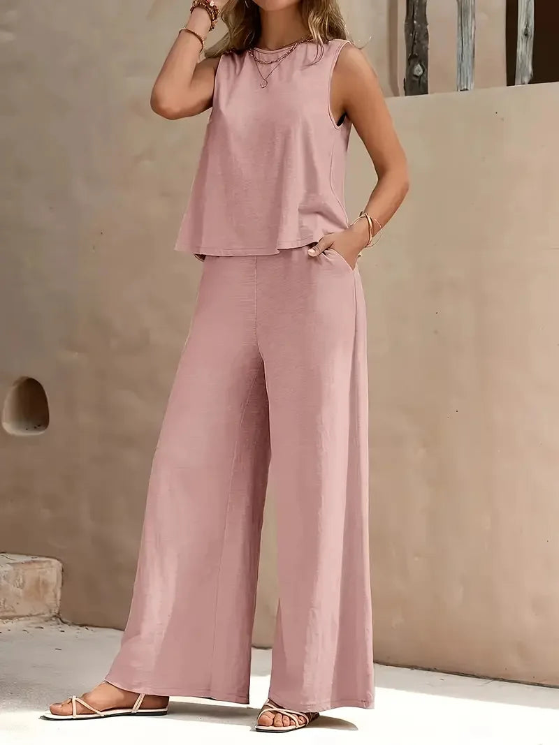 Conjunto femenino 2025 de lino con corte fluido y bolsillos laterales.