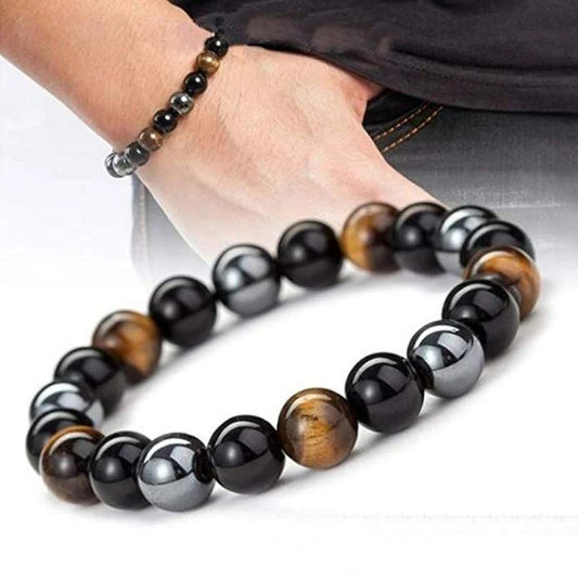 Natural obsidian and hematite bracelet designed to absorb negative energies and promote inner peace and clarity. Ideal for daily wear.